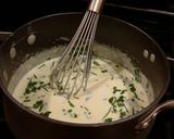 A picture of step 7 of Angel Hair Alfredo "Cakes" with Marinara Sauce and Sausage.