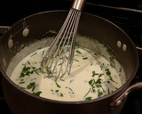 A picture of step 7 of Angel Hair Alfredo "Cakes" with Marinara Sauce and Sausage.