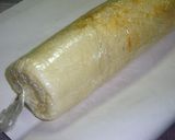 A picture of step 13 of White Roll Cake with White Chocolate.