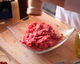 A picture of step 1 of Meatballs cooked in an EVOO from Spain Sauce.