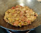 A picture of step 7 of Roasted Green Eggplant Mash or Hare Baingan ka Bharta.