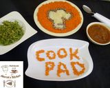 A picture of step 8 of White and orange rice (cookpad logo).
