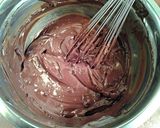 A picture of step 10 of Chocolate Angel Food Cake with White and Dark Chocolate Glaze.