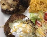 A picture of step 2 of Air Fryer Baked Potato Baked Garlic Parsley Potatoes.