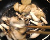 A picture of step 6 of Stir-Fried Mushrooms and Yam with Butter and Soy Sauce.
