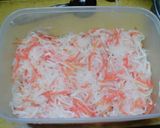 A picture of step 3 of Celebratory Red and White Namasu (Marinated Daikon and Carrot Salad) for New Year's.