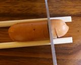 A picture of step 2 of Bear & Flower Bento with 1 Wiener Sausage.