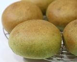 A picture of step 13 of Matcha and White Chocolate Buns Bread Machine Version.