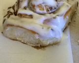 A picture of step 16 of Professional cinnamon rolls topped with cream cheese icing.