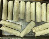 A picture of step 5 of Creamy Baked Chicken Taquitos.