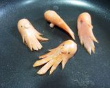 A picture of step 6 of Character Bento : 2 Octopus with 1 Sausage.