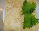 A picture of step 1 of Fried Tofu (Aburaage) Appetizers with Shiso, Bacon, and Cheese.