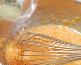 A picture of step 4 of Fluffy Cinnamon Carrot Cake.