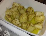 A picture of step 6 of Crispy Lemon Herb Roasted Potatoes.