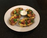 A picture of step 9 of Crispy Bacon, Cheese and Onion Potato Skins.