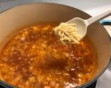 A picture of step 7 of Vegetable, Meat, and Orzo Soup with Zucchini and Country Sausage.