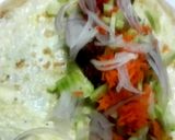 A picture of step 5 of Egg Chicken Kathi Roll.
