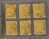 Foto del passaggio 10 della ricetta Sfogliatine con budino alla vaniglia ananas e amaretti