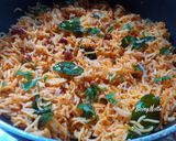 A picture of step 4 of Phodnicha Bhaat.