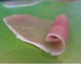 A picture of step 2 of How to Make a Rose with Cured Ham.