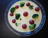 A picture of step 2 of Broccoli and Tomato Christmas Flan.