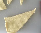 A picture of step 2 of Cheeseburger Crescent Rolls.