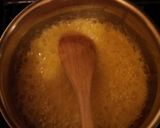 A picture of step 4 of A 'latte' the old fashioned way with smooth caramel sauce and hand made white chocolate chunks.
