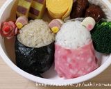 A picture of step 11 of Hinamatsuri Charaben Rilakkuma Hina Dolls.