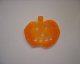 A picture of step 4 of Halloween Jack-o-Lantern made from Carrots.