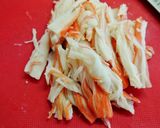 A picture of step 4 of Simple Daikon Radish & Crab Stick Salad.