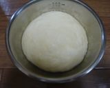 A picture of step 5 of Simple Fluffy Mini Bread Loaves Using a Pound Cake Pan.