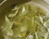 A picture of step 2 of Our Family's Recipe Kiritanpo Hot Pot.