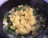 Une image de l'étape 4 de Soupe au chou carottes pommes de terre saucisse fumée et persil.