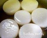 A picture of step 2 of Preparation of Daikon Radish for Making Oden Hot Pot in a Pressure Cooker.
