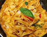 A picture of step 3 of Fettuccine Pasta in red sauce.