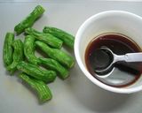 A picture of step 4 of Sweet and Salty Simmered Konnayku and Atsuage Fried Tofu.