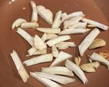 A picture of step 1 of Stir-Fried Snow Pea Leaves with King Oyster Mushrooms.