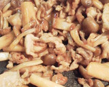 A picture of step 7 of Stir Fried Pork, Shimeji Mushrooms and King Oyster Mushrooms with Oyster Sauce.