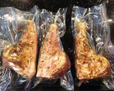 A picture of step 8 of Lamb Shanks sous vide with rosemary, sage and thyme butter.