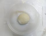 A picture of step 5 of Melt in Your Mouth Round Bread with Heavy Cream.