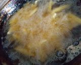 A picture of step 3 of Dynamite cheese loaded fries.