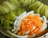 A picture of step 8 of Chinese-style Napa Cabbage Rolls.