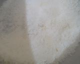 A picture of step 1 of Coconut Laddu.