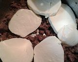 A picture of step 3 of Cheesy sausage with poached eggs.