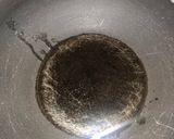 A picture of step 3 of Achari chicken.