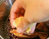 A picture of step 11 of Ultra-Easy Plump Squid Stuffed with Rice (Ikameshi) and Teriyaki-Style Sauce.