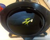 A picture of step 2 of Cauliflower and Tomato Stir-Fry.