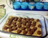 A picture of step 4 of Blondie-Brownie Peanut Butter Cup Sandwiches.