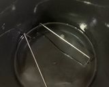 A picture of step 4 of Stove Top Pressure Cooker Baby Back Ribs — BBQ sauce.