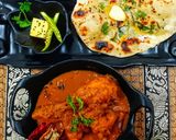 A picture of step 1 of Spicy Bihari chicken curry and naan.